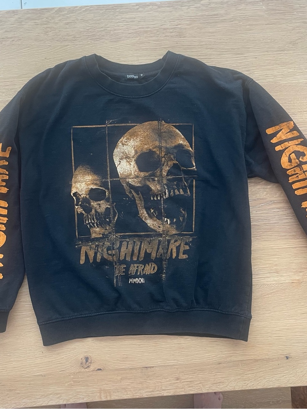 Boohoo Black Crewneck Sweatshirt with Gold Skull Graphic